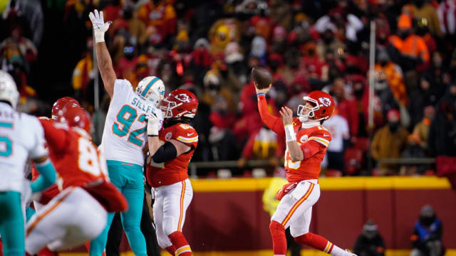 Jan 13, 2024; Kansas City, Missouri, USA; Kansas City Chiefs quarterback Patrick Mahomes (15) throws against the Miami Dolphins during the first half of the 2024 AFC wild card game at GEHA Field at Arrowhead Stadium. Mandatory Credit: Jay Biggerstaff-USA TODAY Sports  